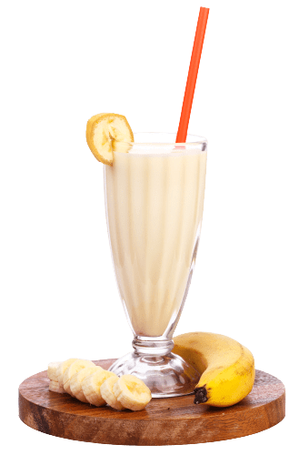 A glass of milk with a straw and a cookie on a plate
