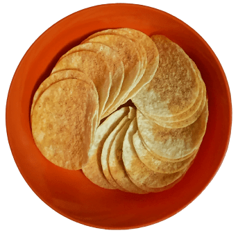 A bowl of crispy potato chips with ridged texture